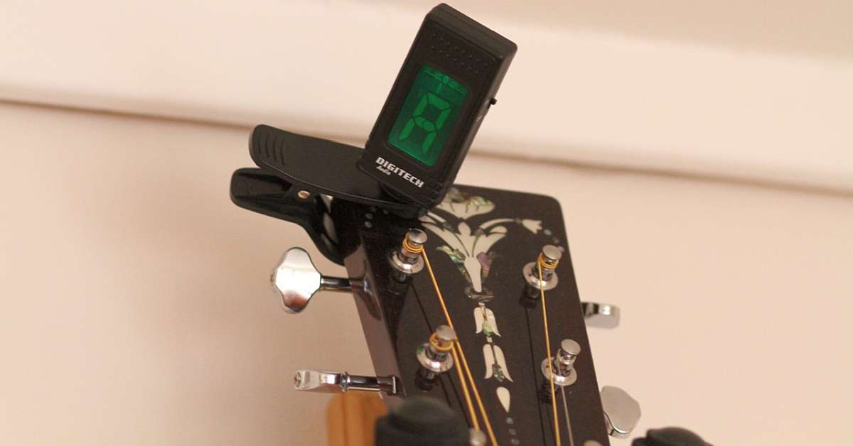 A small clip-on guitar tuner on headstock