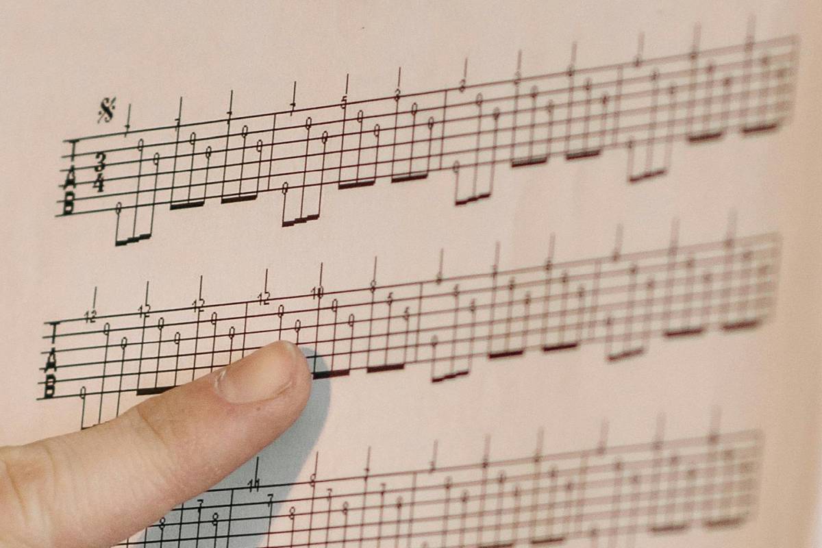 The guitar tablature for Spanish Romance or Jeux Interdits, showing a complete tablature with rhythmic information